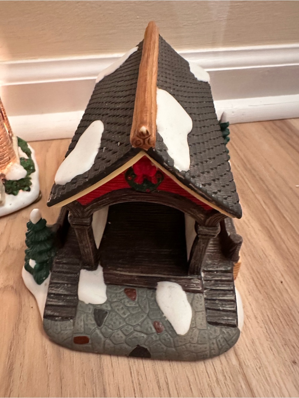 St. Nicholas Square Red and Green Snow-Topped Covered Bridge Figurine
